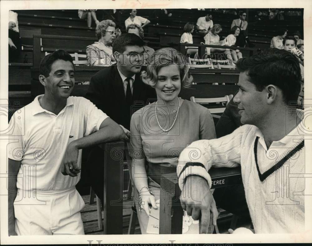 1964 Press Photo Mr. and Mrs. Chico Young and Tony Palafox attend game- Historic Images