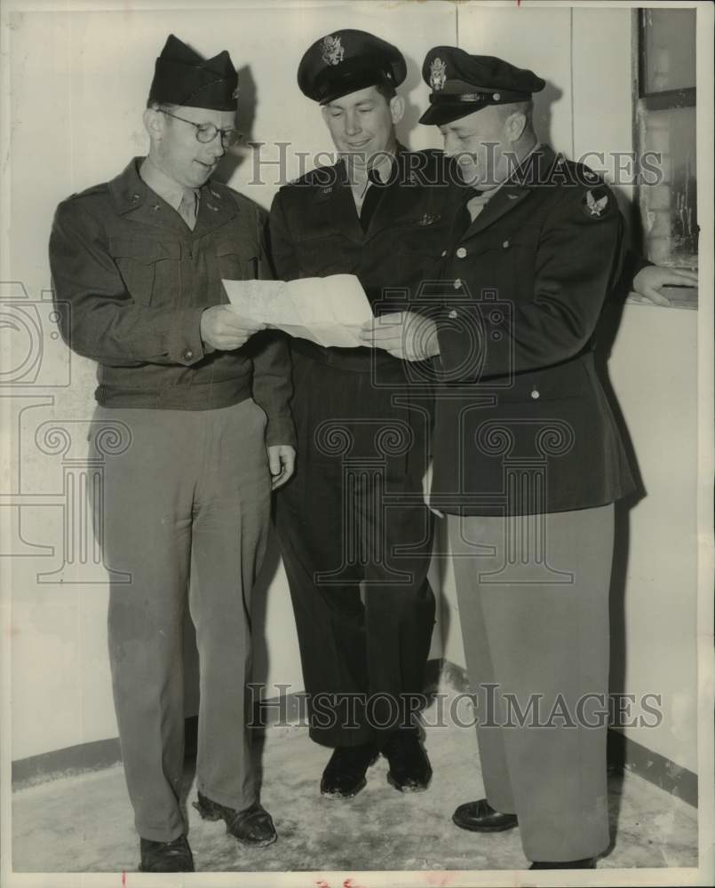 1951 Press Photo Officials of Aircraft Center review plans for alert system; TX