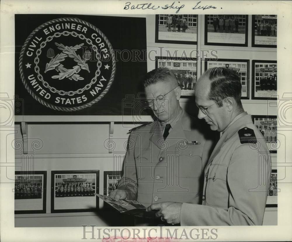 1952 Press Photo Military officers look at USS Texas' brochure; California