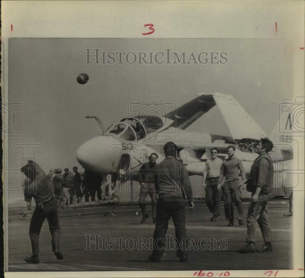 1972 Press Photo Crew toss football on deck of USS Coral Sea, off Vietnam coast