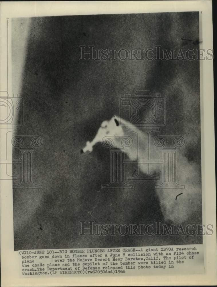 1966 Press Photo F-104 chase plane goes down in flames over Mojave Desert