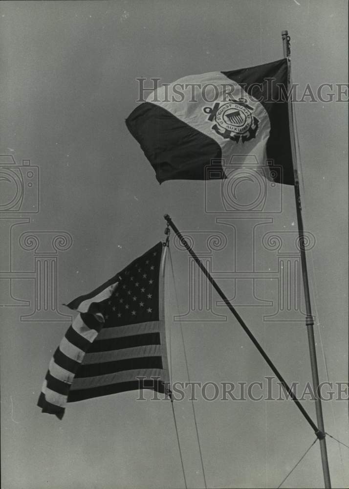1970 Press Photo American and United States Coast Guard flags waving in wind