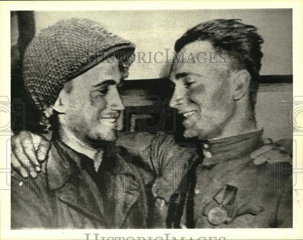 1945 Press Photo American and Russian soldiers embrace at Elbe River - hcm02691- Historic Images