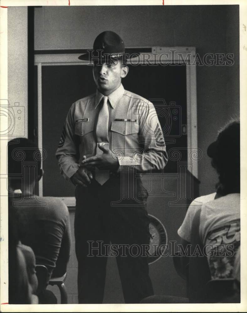 1984 Press Photo Marine Sergeant Mike Caballero speaking at a local high school- Historic Images