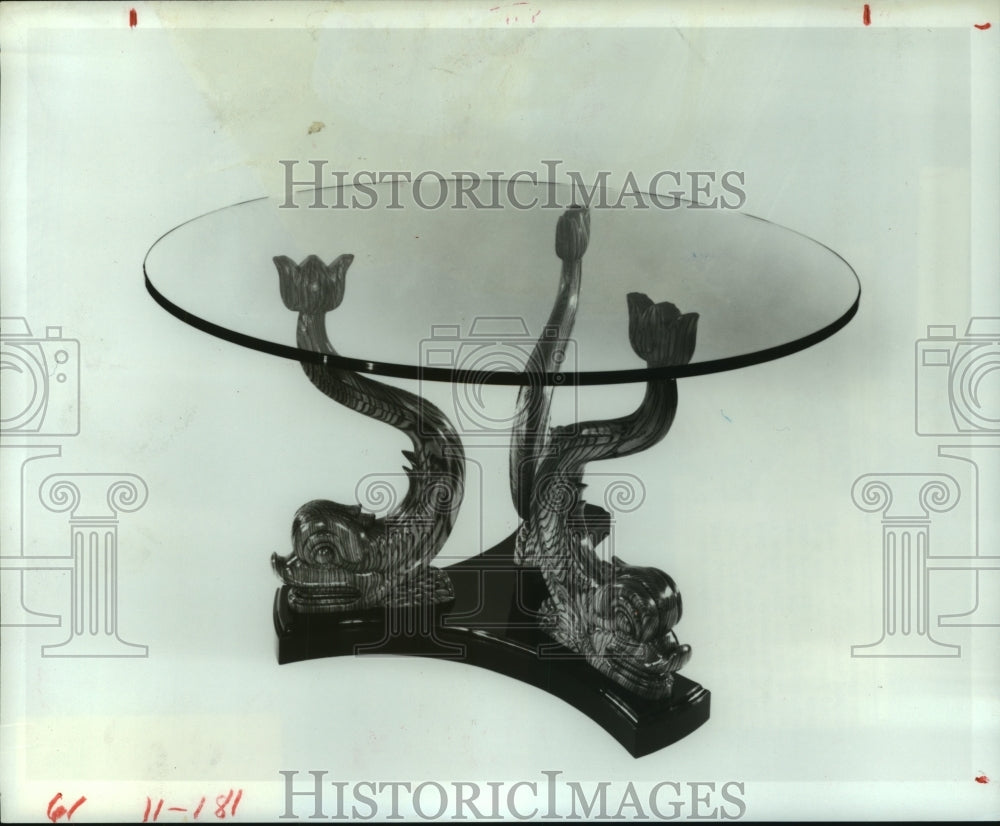 1984 Press Photo Dolphins carved of zebra wood to form dramatic table base.- Historic Images