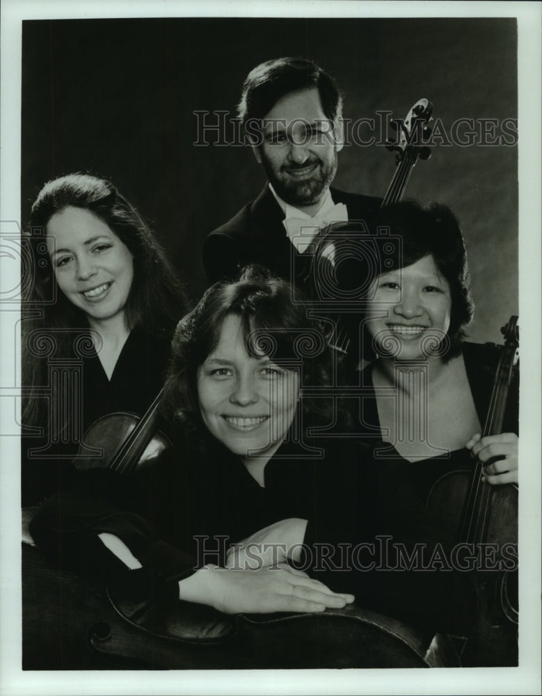 1989 Press Photo Members of The Classical Quartet pose with their instruments- Historic Images