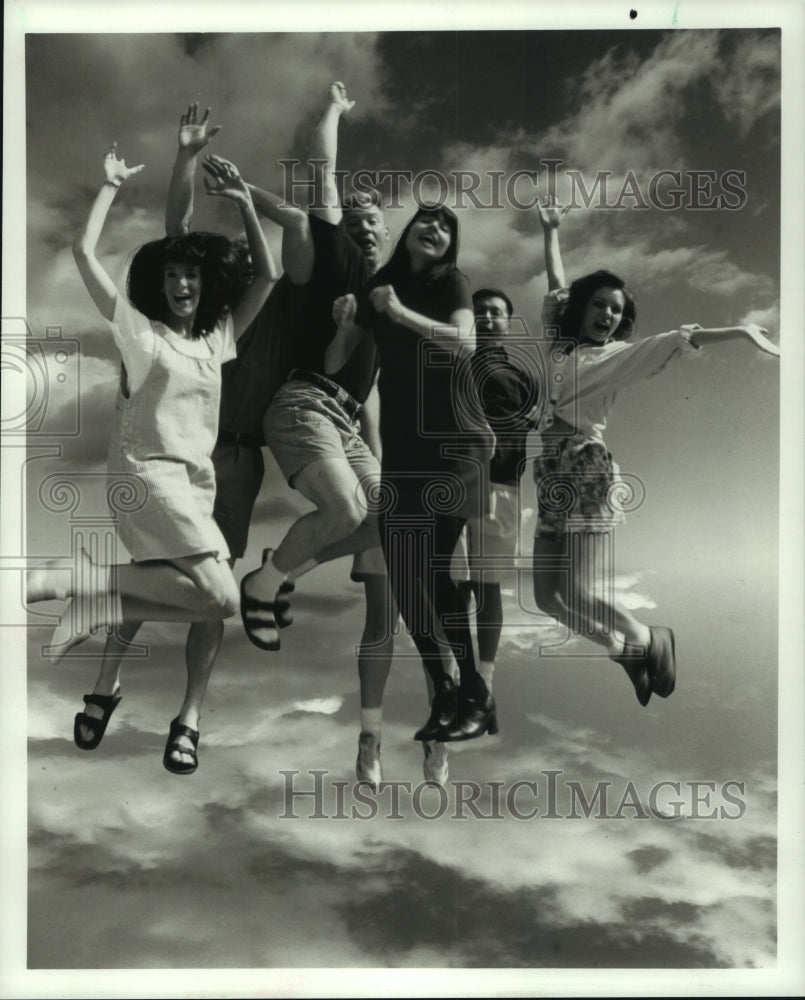 1996 Press Photo Cast of the TV movie Class Reunion jump for joy - hcp03925- Historic Images