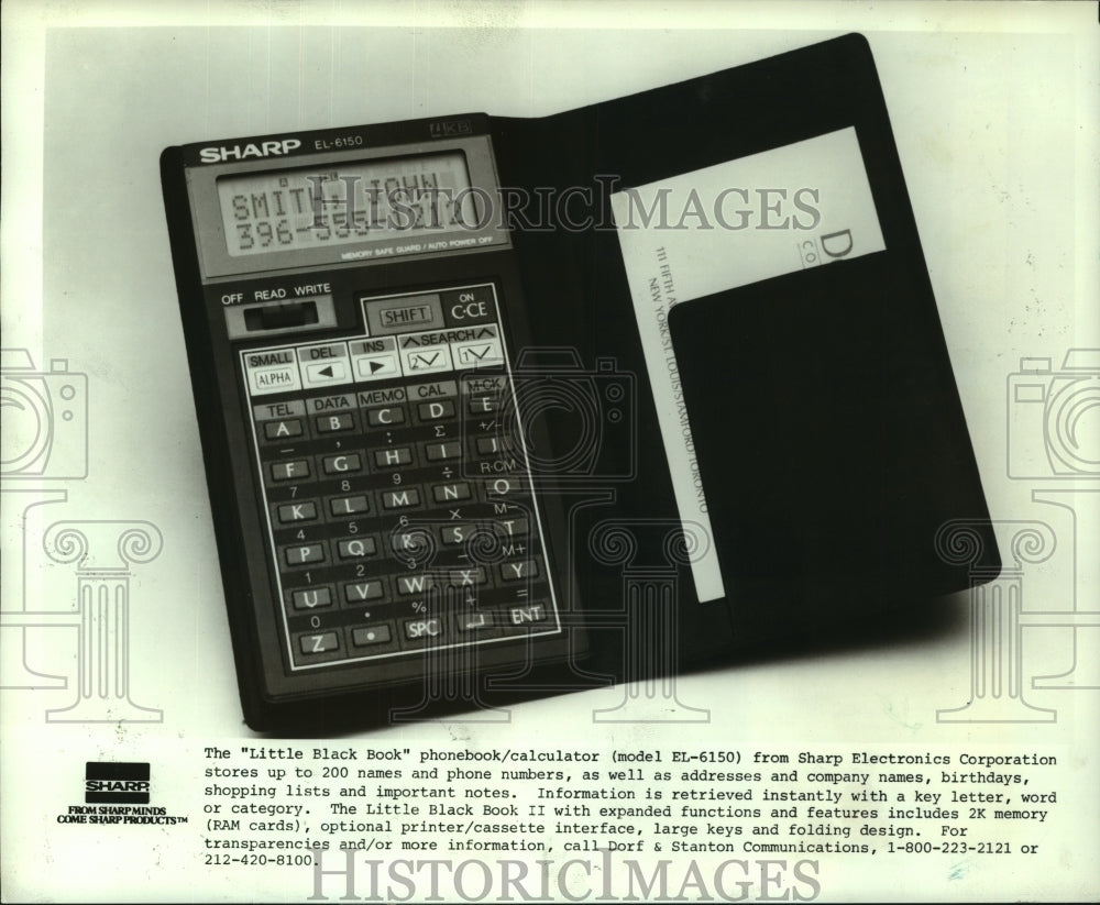 1986 Press Photo The &quot;Little Black Book&quot; from Sharp Electronics Corporation.- Historic Images