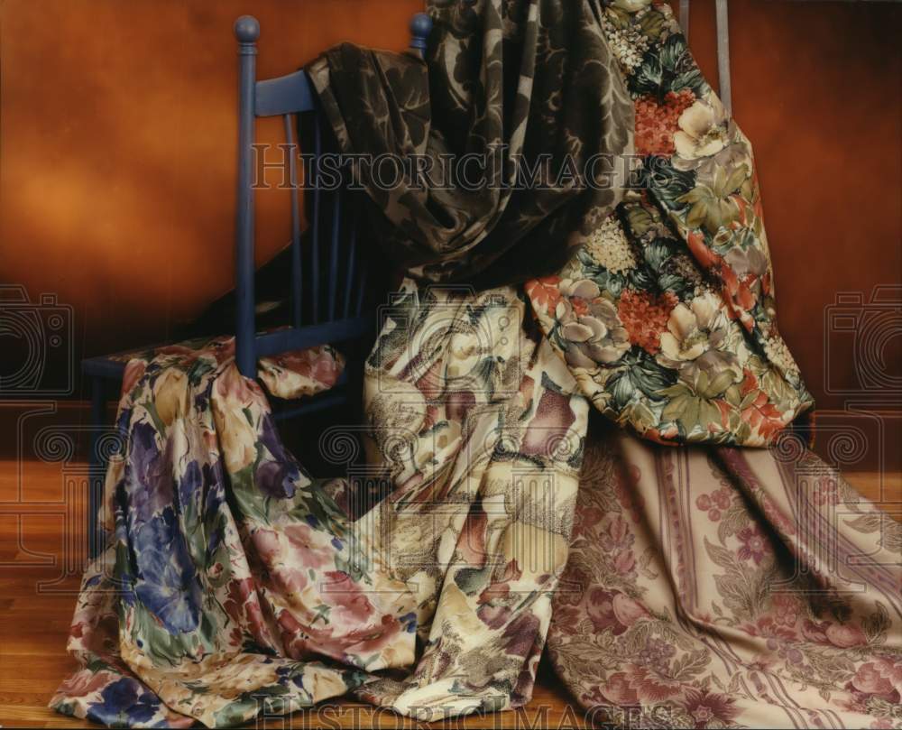 1992 Press Photo Floral fabrics draped over chair - hcp08342- Historic Images