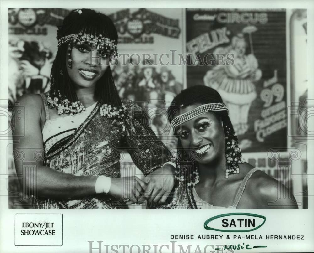 1986 Press Photo Satin: Denise Aubrey and Pa-Mela Hernandez - hcp09491- Historic Images