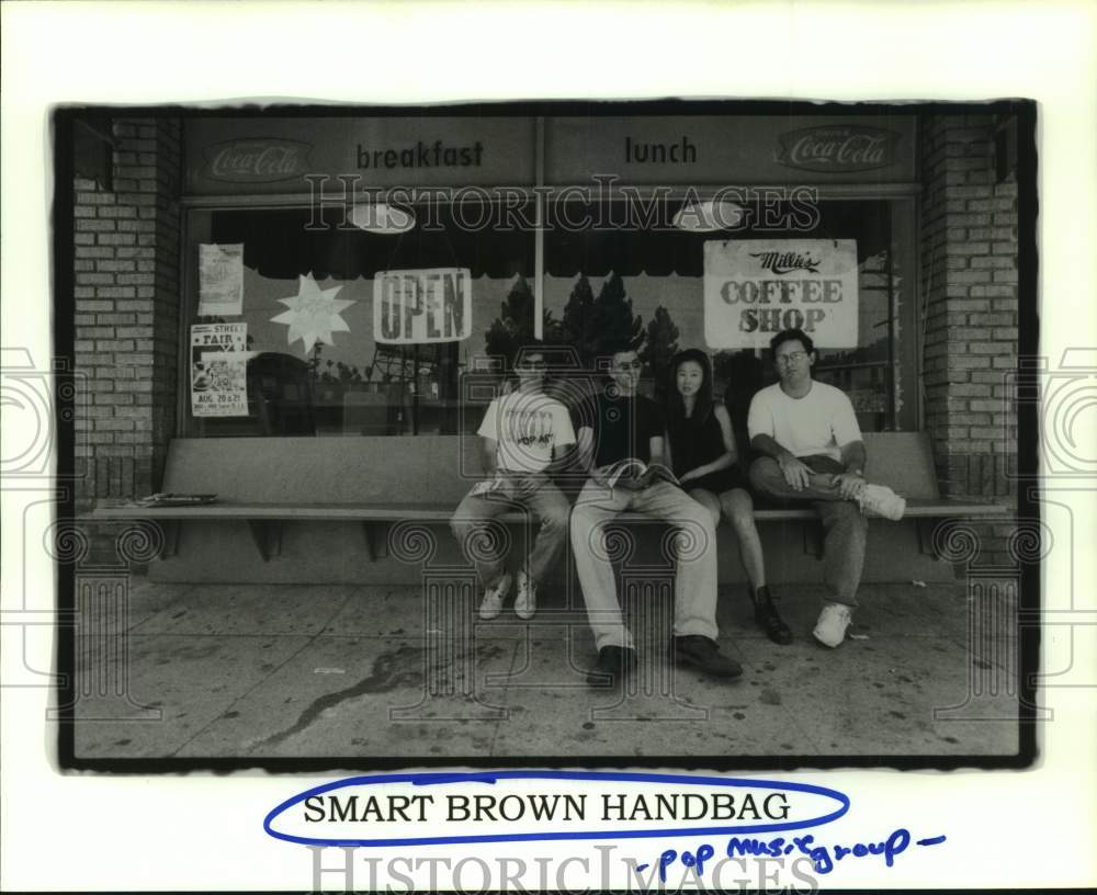 1994 Press Photo Pop Music Group &quot;Smart Brown Handbag&quot; - hcp10900- Historic Images