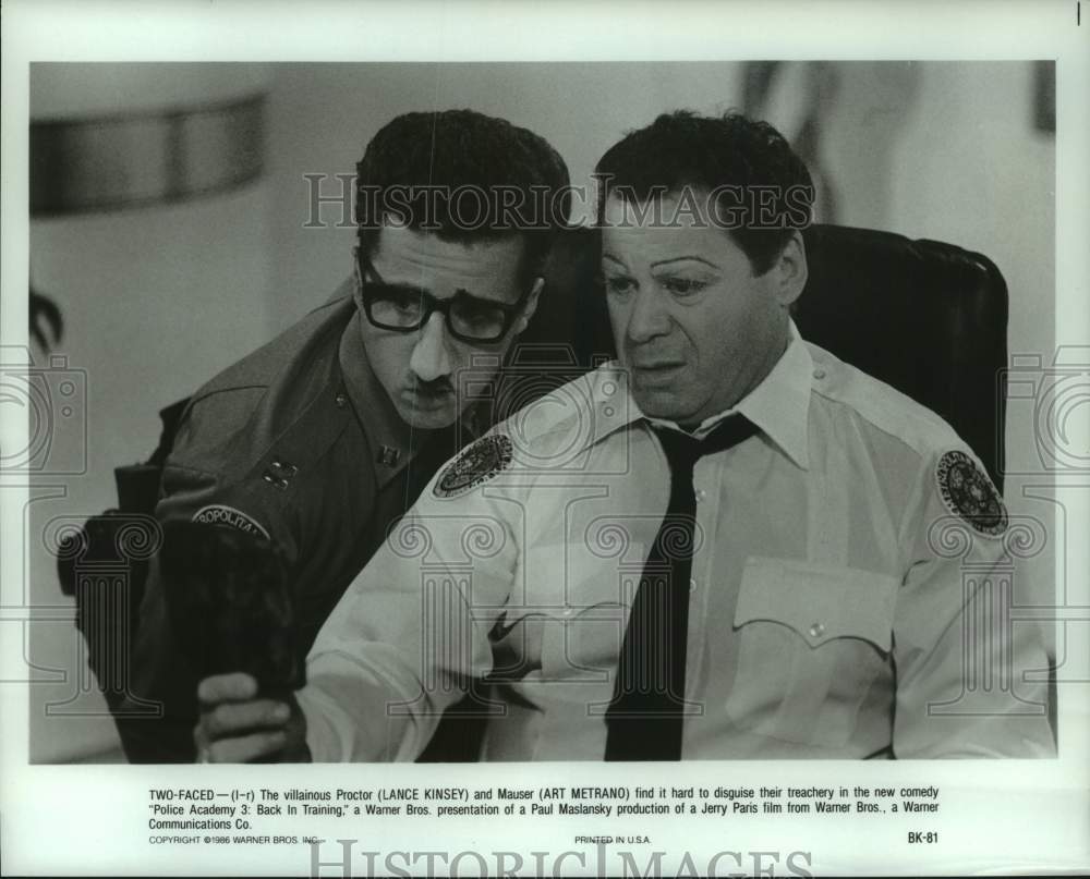 1986 Press Photo Actors Lance Kinsey and Art Metrano in &quot;Police Academy 3&quot;- Historic Images