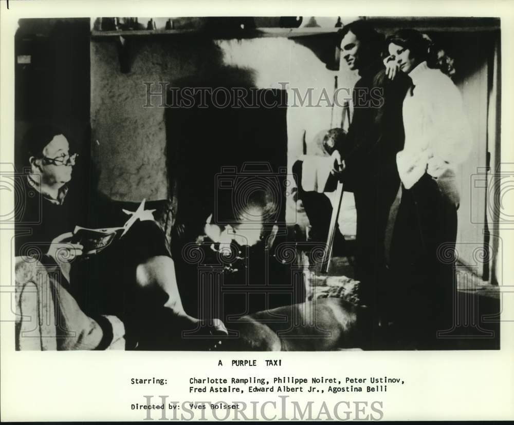 Press Photo Charlotte Rampling and Philippe Noiret in A Purple Taxi. - hcp51513- Historic Images