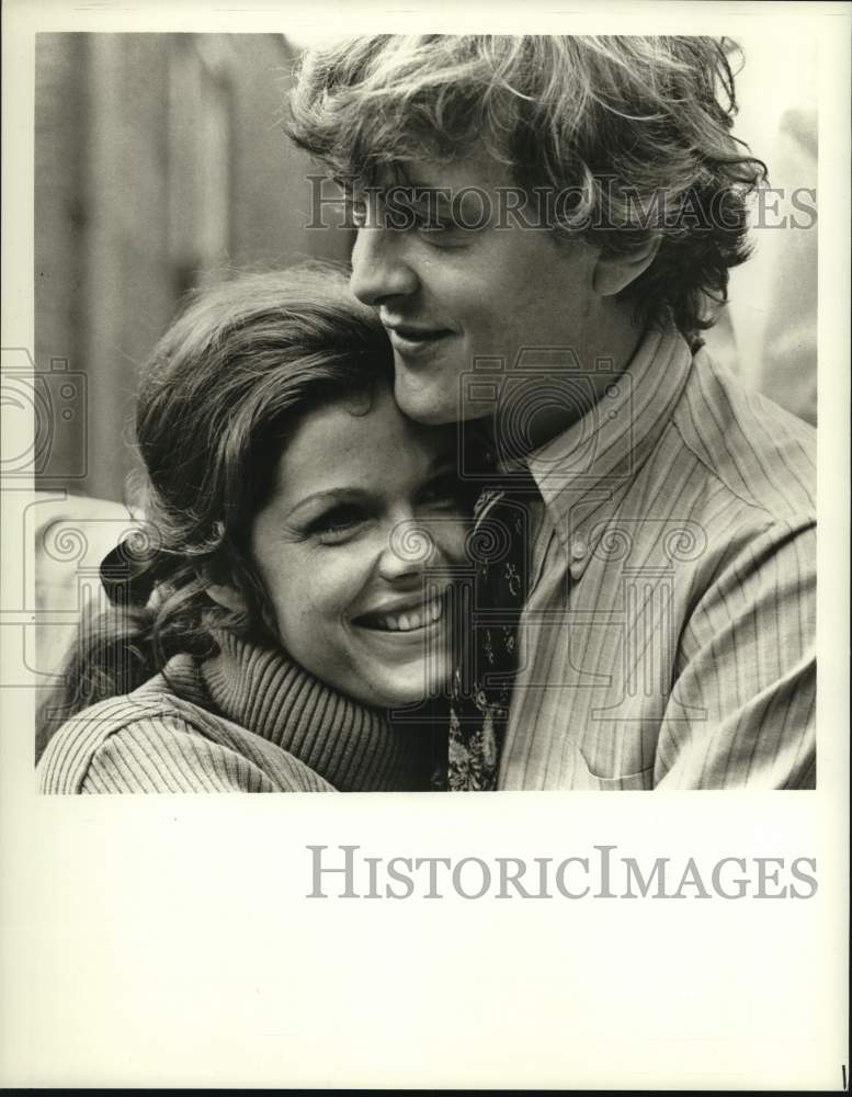 Press Photo Scene from movie with actor and actress hugging. - hcp53684- Historic Images