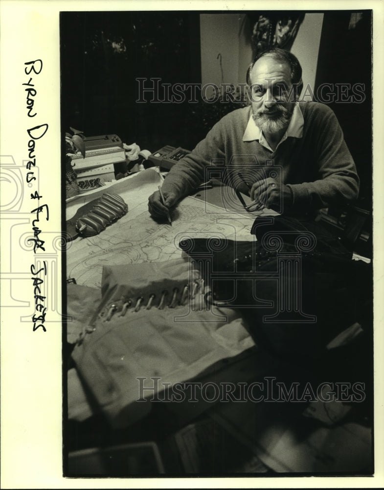 1979 Press Photo Flak jacket designer, Byron Donzis busy at work. - hcs03054- Historic Images