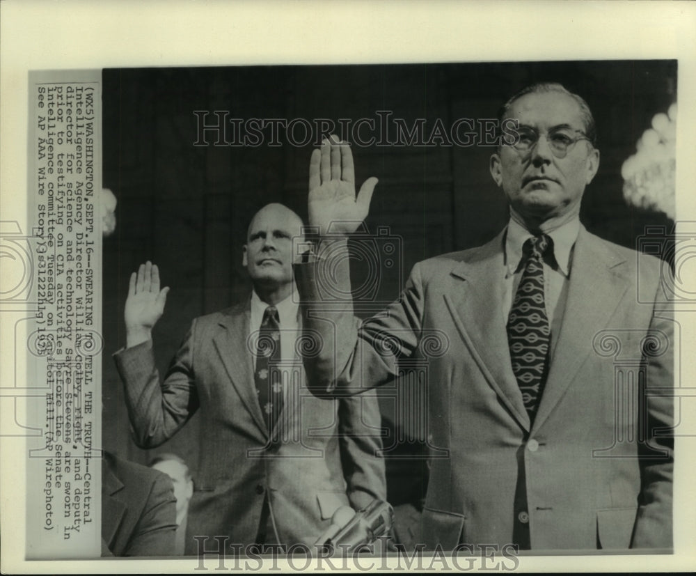 1975 Press Photo William Colby and Sayre Stevens are sworn in before testifying.- Historic Images