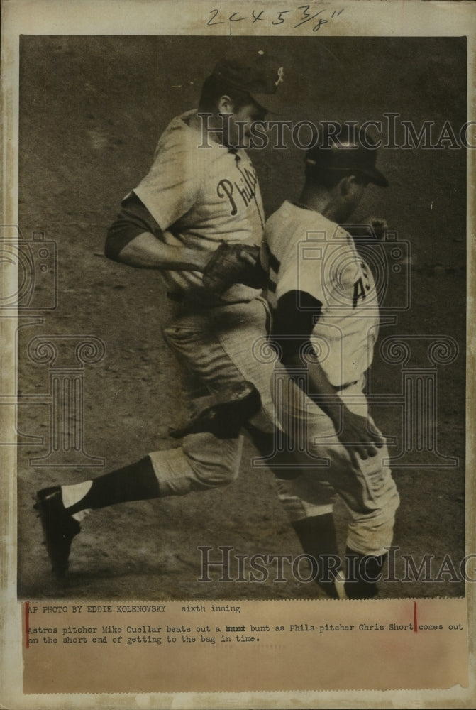 1968 Press Photo Houston Astros' pitcher Mike Cuellar beats out a bunt.- Historic Images