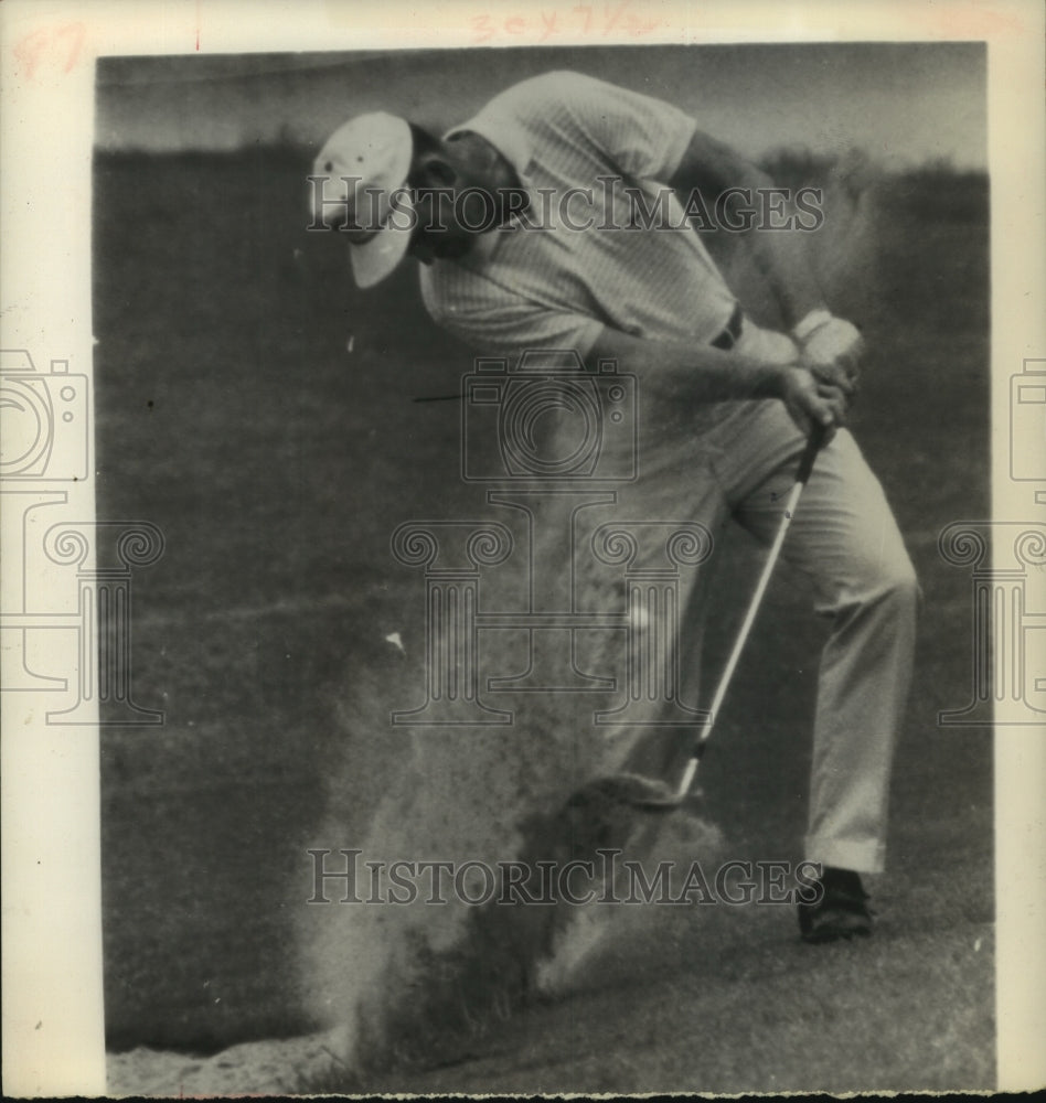 1964 Press Photo Golfer hits ball from sand trap. - hcs06504- Historic Images