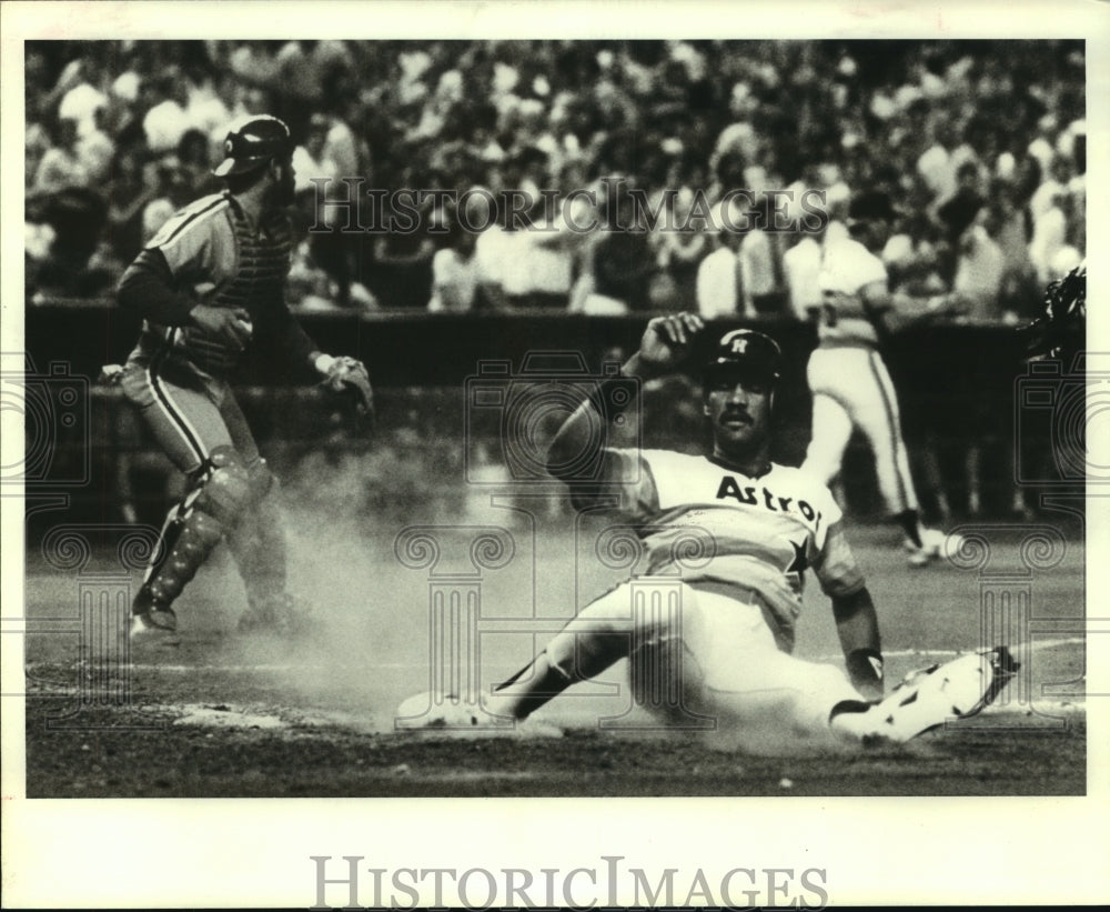 1984 Press Photo Houston Astros&#39; baseball player slides safely to score a run.- Historic Images