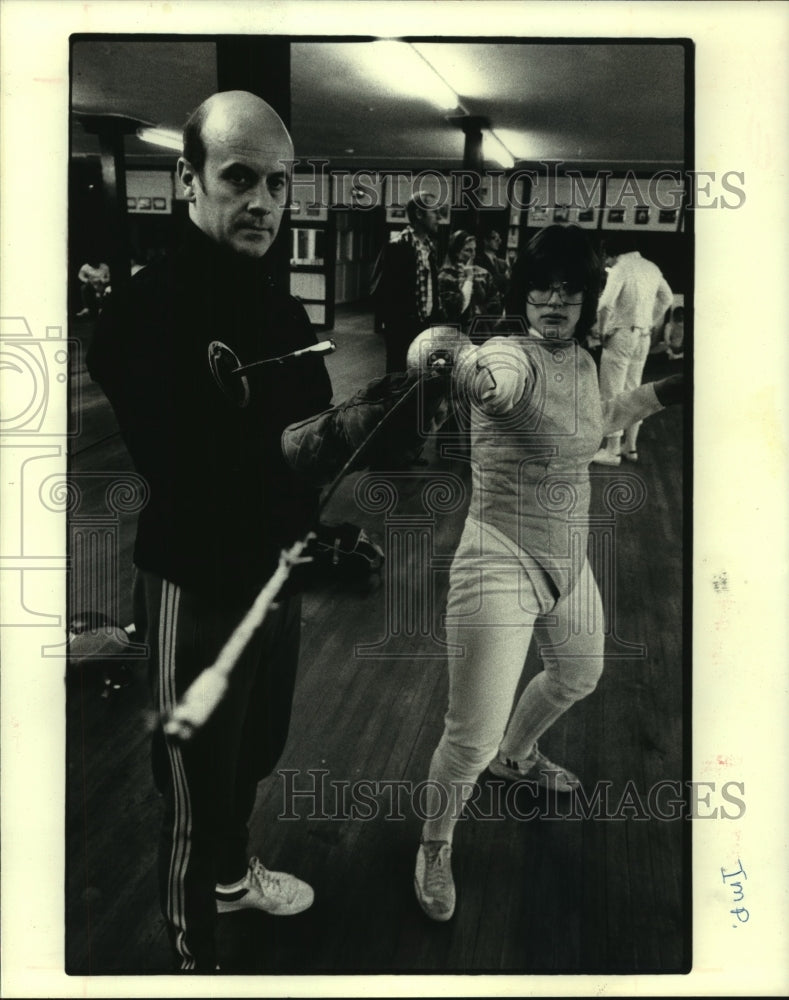 1979 Press Photo Fencing teacher Michel Sebastiani coaches Tracy Kelton.- Historic Images