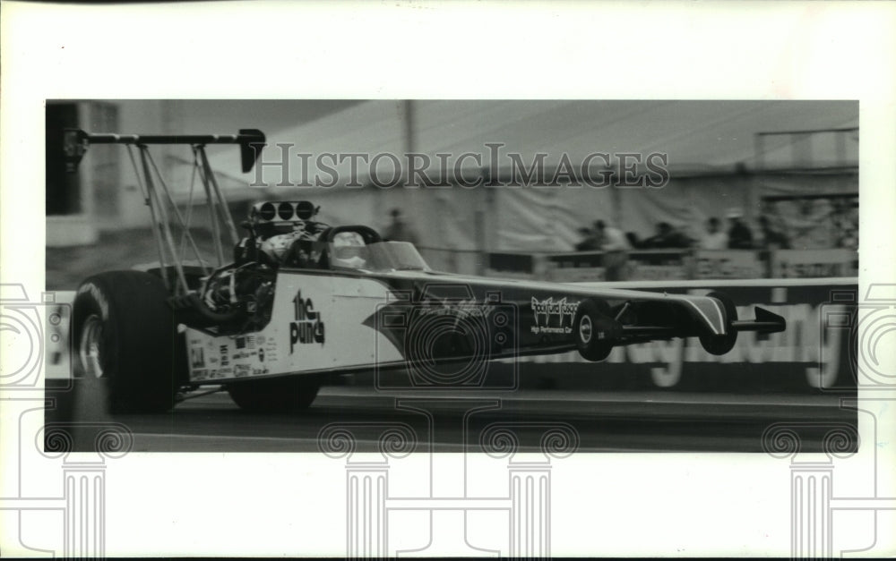 1991 Press Photo Alcohol drag racer Troy Buff of Houston launches from the line.- Historic Images