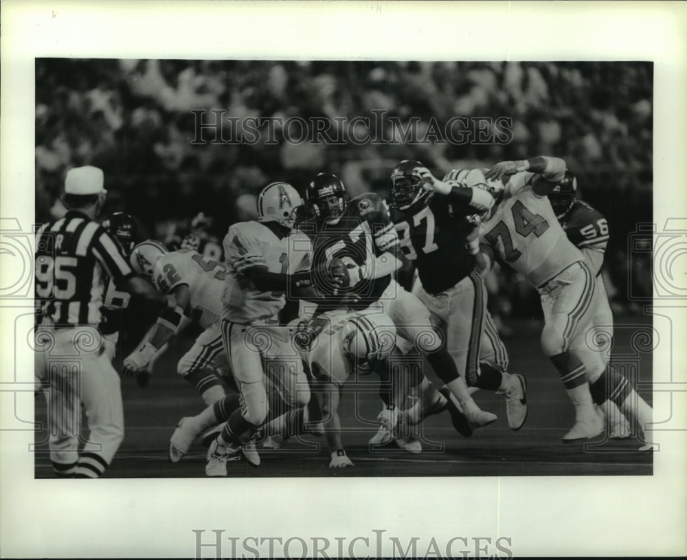 1989 Press Photo Houston Oilers&#39; quarterback Warren Moon drops back to pass.- Historic Images