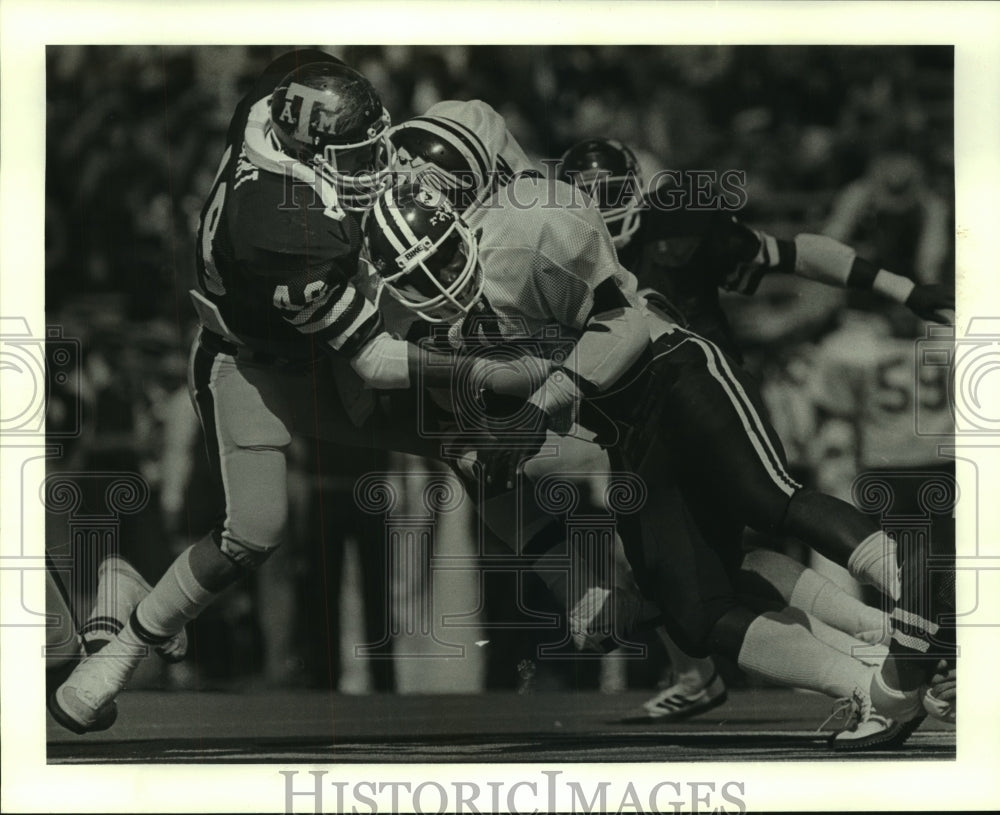 1982 Press Photo RIce&#39;s Larry Collins is stopped by Texas A&amp;M&#39;s Jon Van Sant.- Historic Images