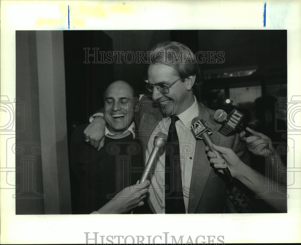 1990 Press Photo Rudy Davalos and John Jenkins after signing contract extension.- Historic Images