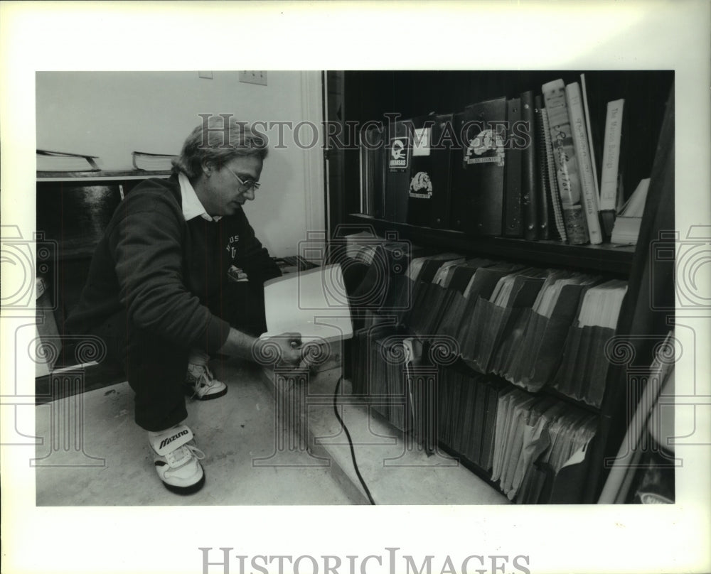 1990 Press Photo University of Houston John Jenkins looks over game plans.- Historic Images