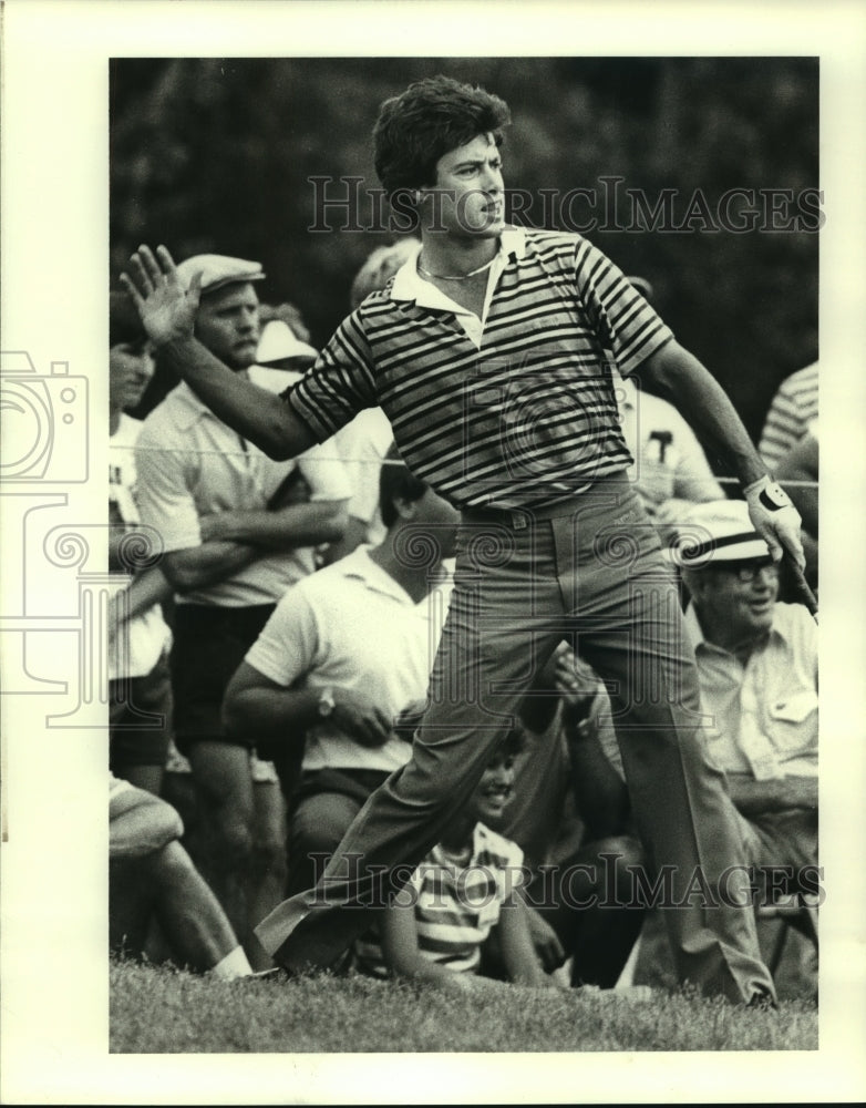 1983 Press Photo Canadian golfer Jim Nelford gives his chip shot a push.- Historic Images