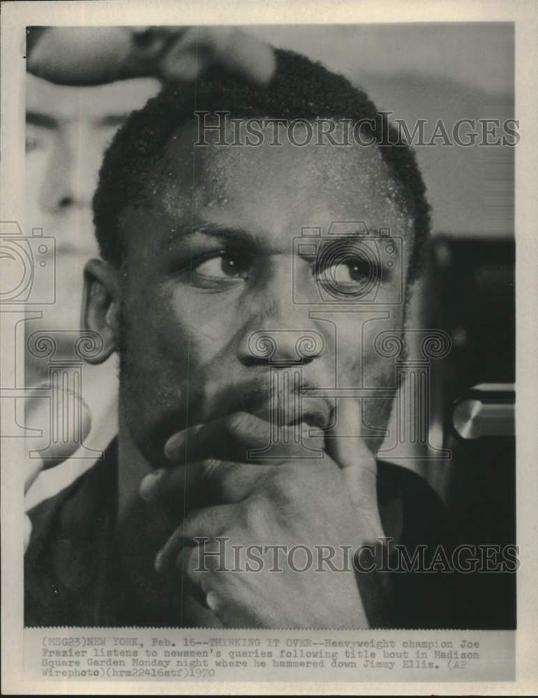 1970 Press Photo Boxer Joe Frazier faces newsmen after title bout in New York- Historic Images
