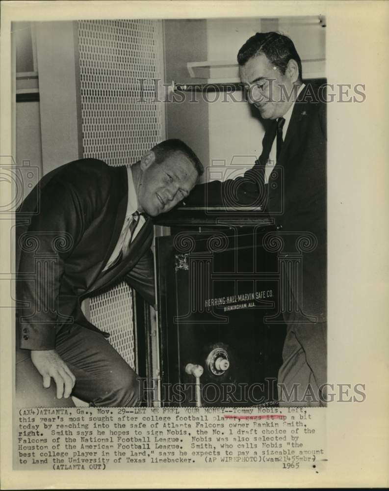 1956 Press Photo No.1 draftee Tommy Nobis jokes with Falcons&#39; owner Rankin Smith- Historic Images