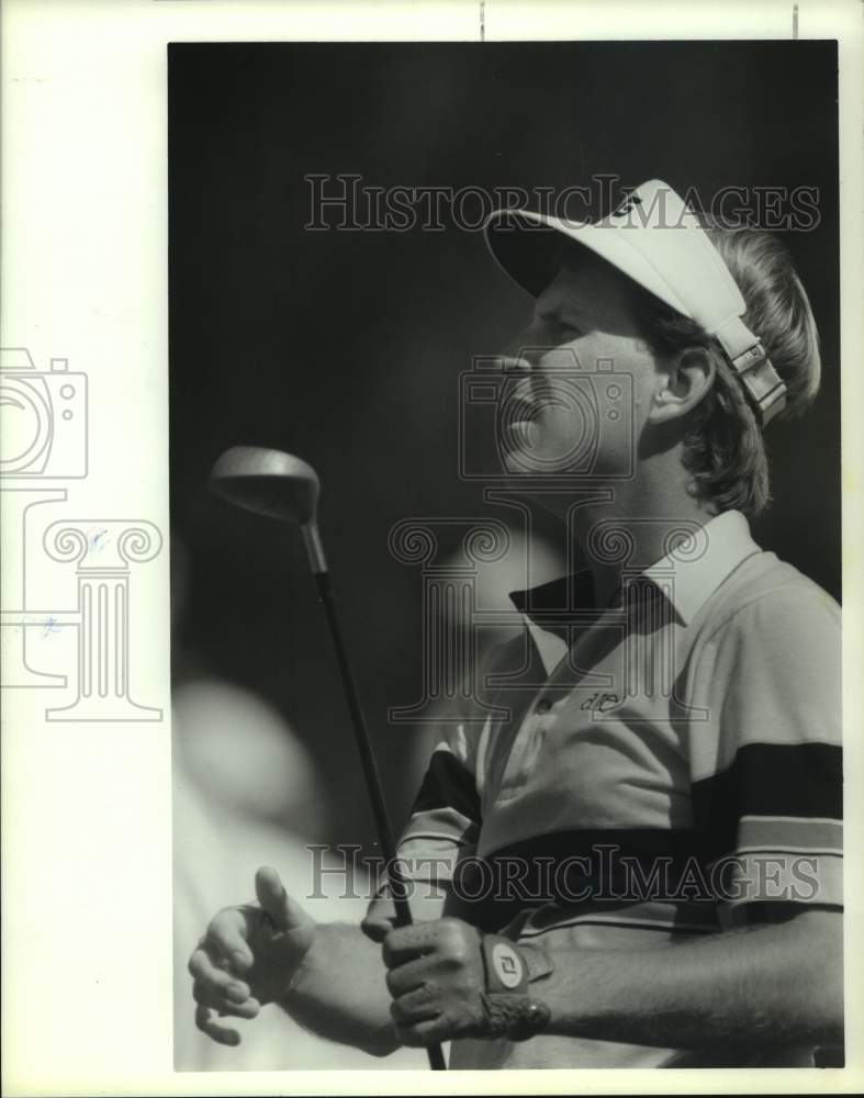 1989 Press Photo Pro golfer Joe Inman watches his drive off the tee. - hcs12444- Historic Images