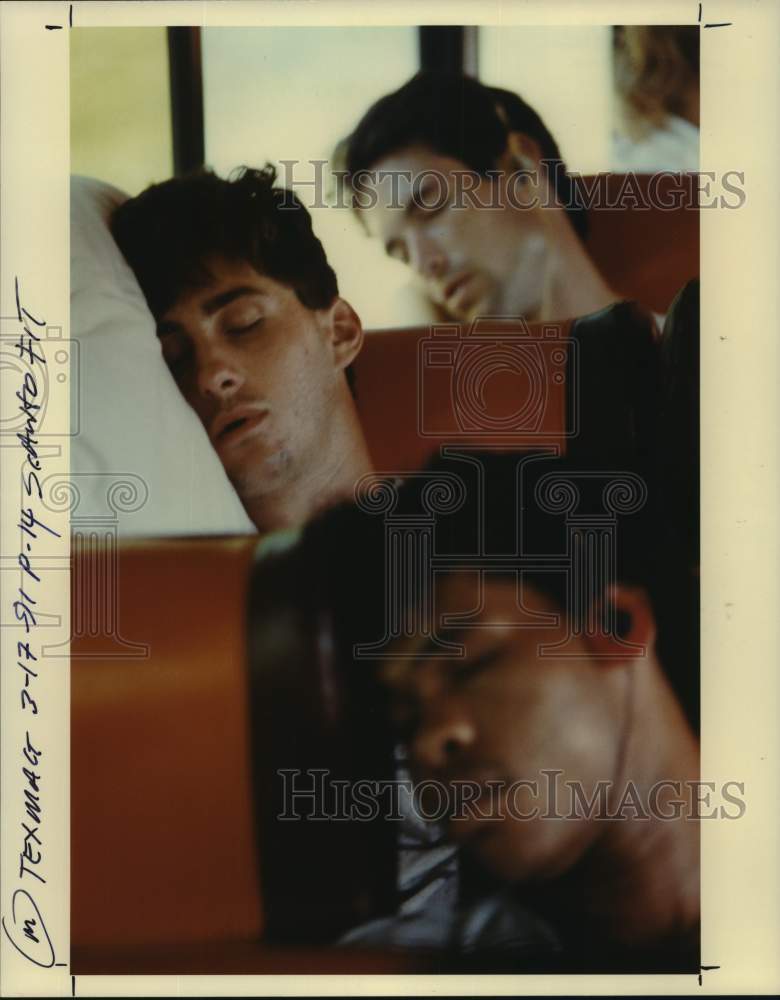 1991 Press Photo Asheville Tourists&#39; players sleep on the bus after road trip.- Historic Images