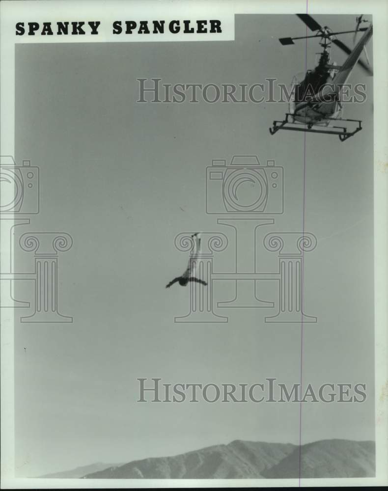 1981 Press Photo Stuntman Sparky Spangler leaps out of a helicopter. - hcs15992- Historic Images