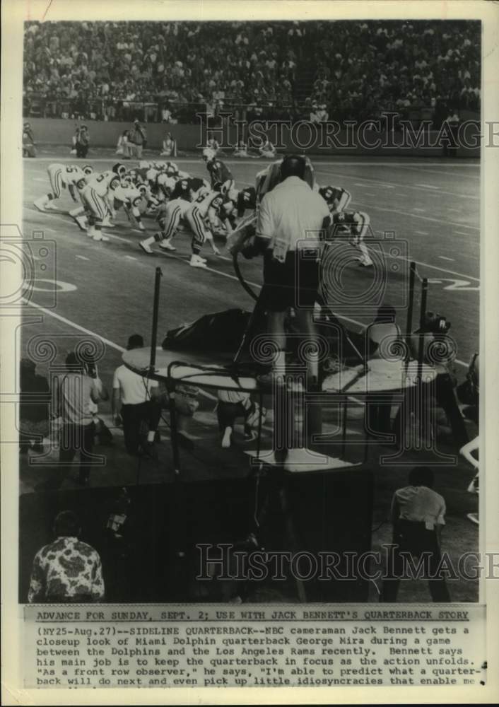 1973 Press Photo NBC cameraman Jack Bennett gets birds-eye view of the action.- Historic Images