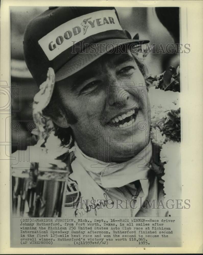 1973 Press Photo Race drive Johnny Rutherford celebrates win of Michigan 250.- Historic Images