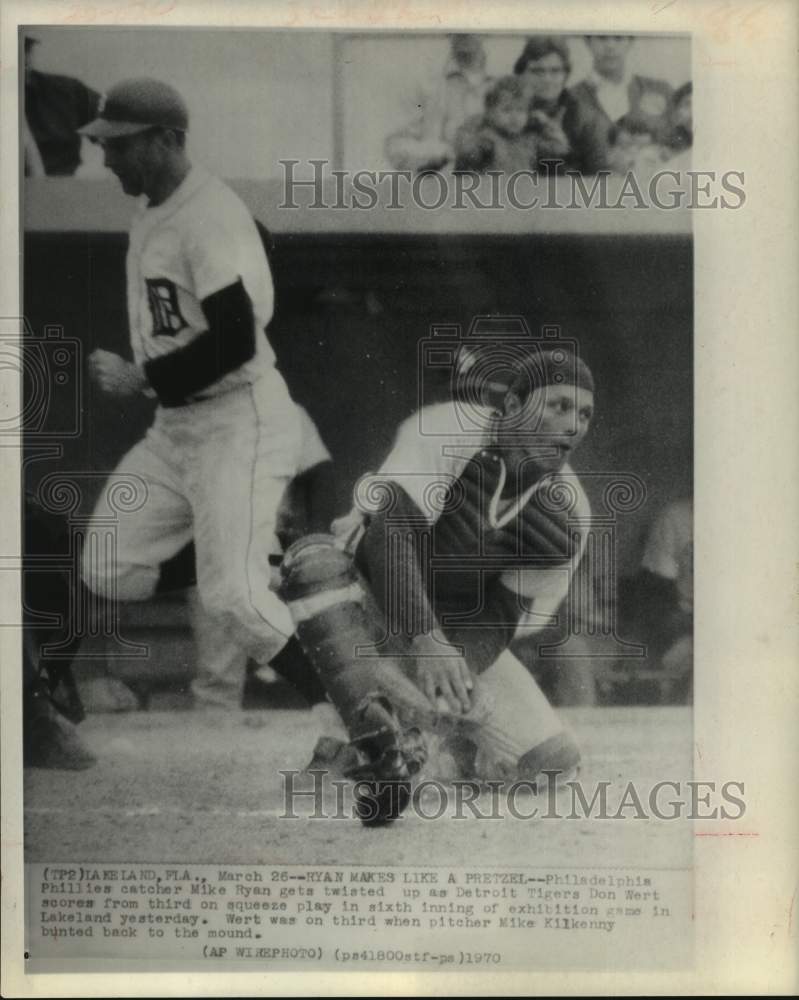 1970 Press Photo Phillies Mike Ryan makes like pretzel as Tigers Don Wert scores- Historic Images