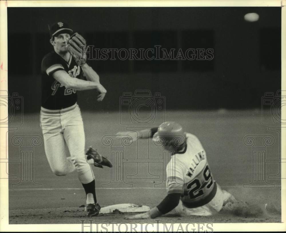 1980 Press Photo Houston&#39;s Denny Walling slides in as Giants player throws ball- Historic Images