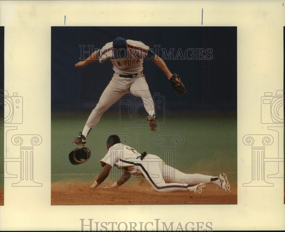 1990 Press Photo Astros outfielder Eric Yelding slides head-first into second- Historic Images