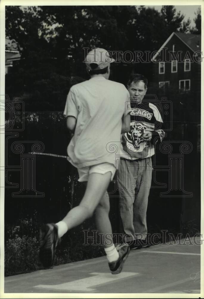 1990 Press Photo Former U.S. distance runner Max Truex times his son Gene, 16- Historic Images