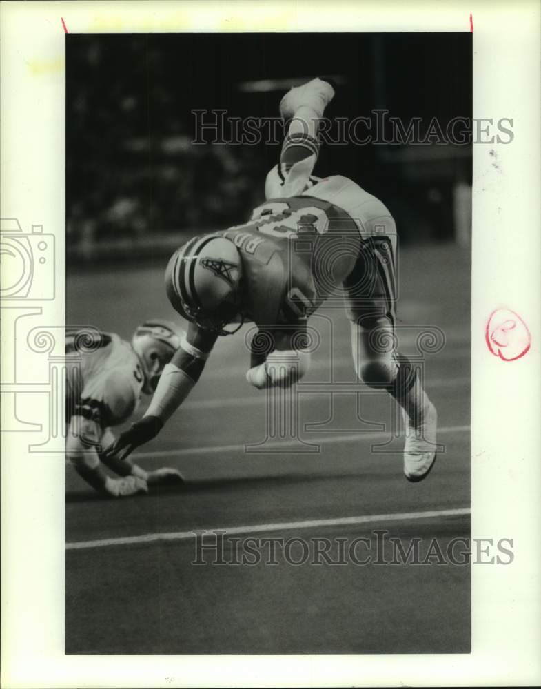1988 Press Photo Oilers' Mike Rozier scores touchdown against the Seahawks.- Historic Images