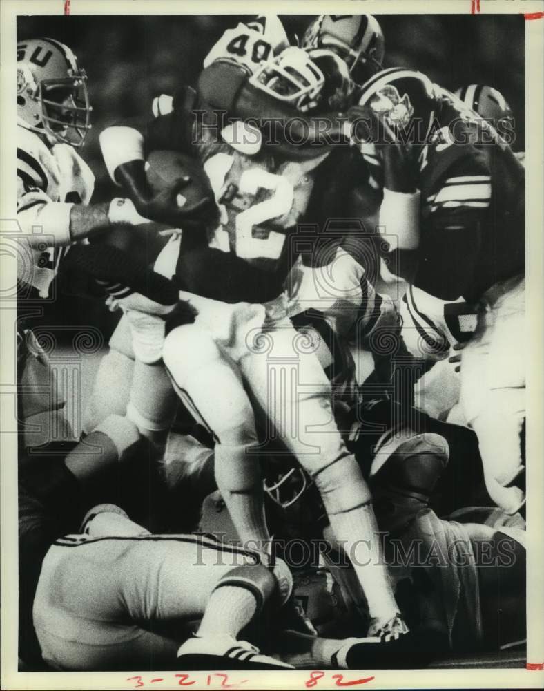 1978 Press Photo Rice's Calvin Fance is stopped by LSU's Marcus Quinn.- Historic Images