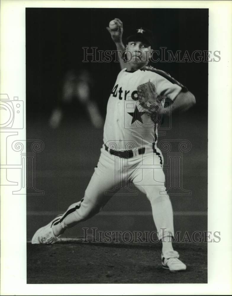 1991 Press Photo Astros pitcher Mark Portugal pitches in game against Cardinals- Historic Images