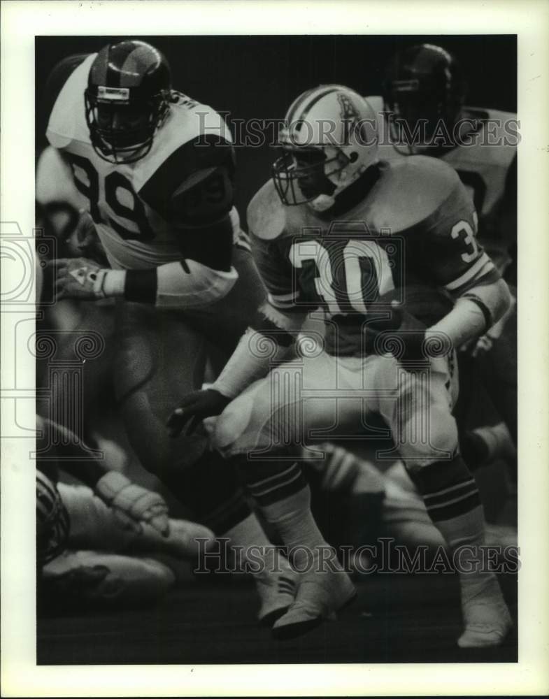 1987 Press Photo Houston Oilers football player Mike Rozier #30 runs with ball- Historic Images