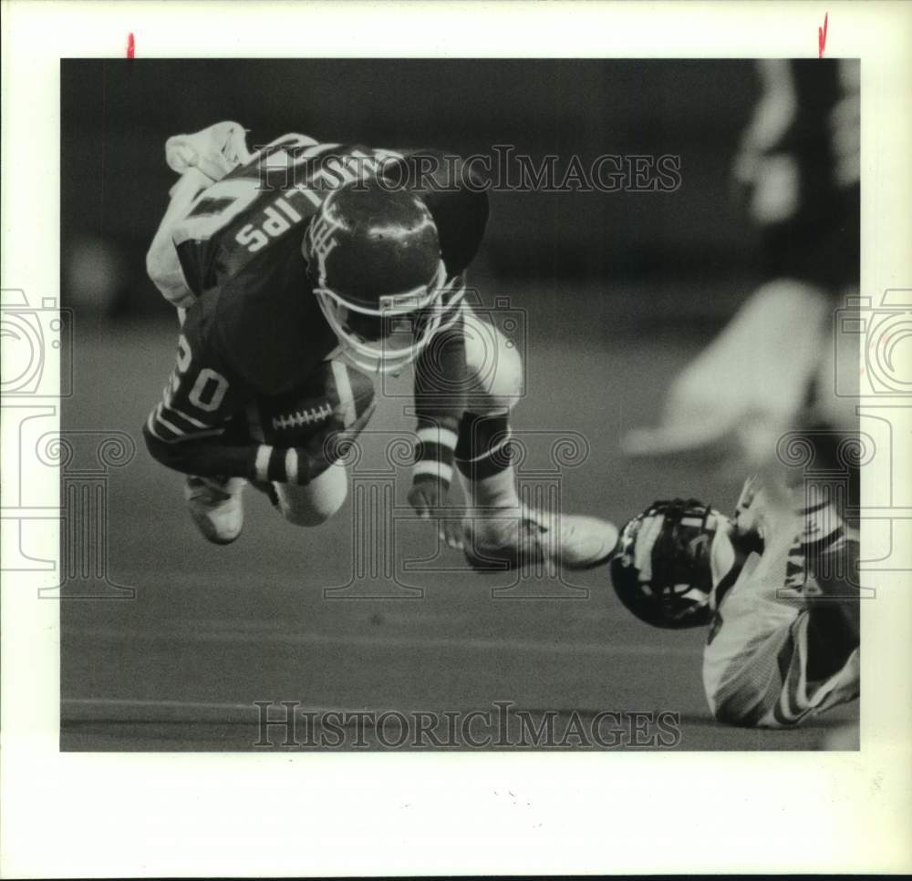 1987 Press Photo University of Houston football player Jason Phillips in action- Historic Images