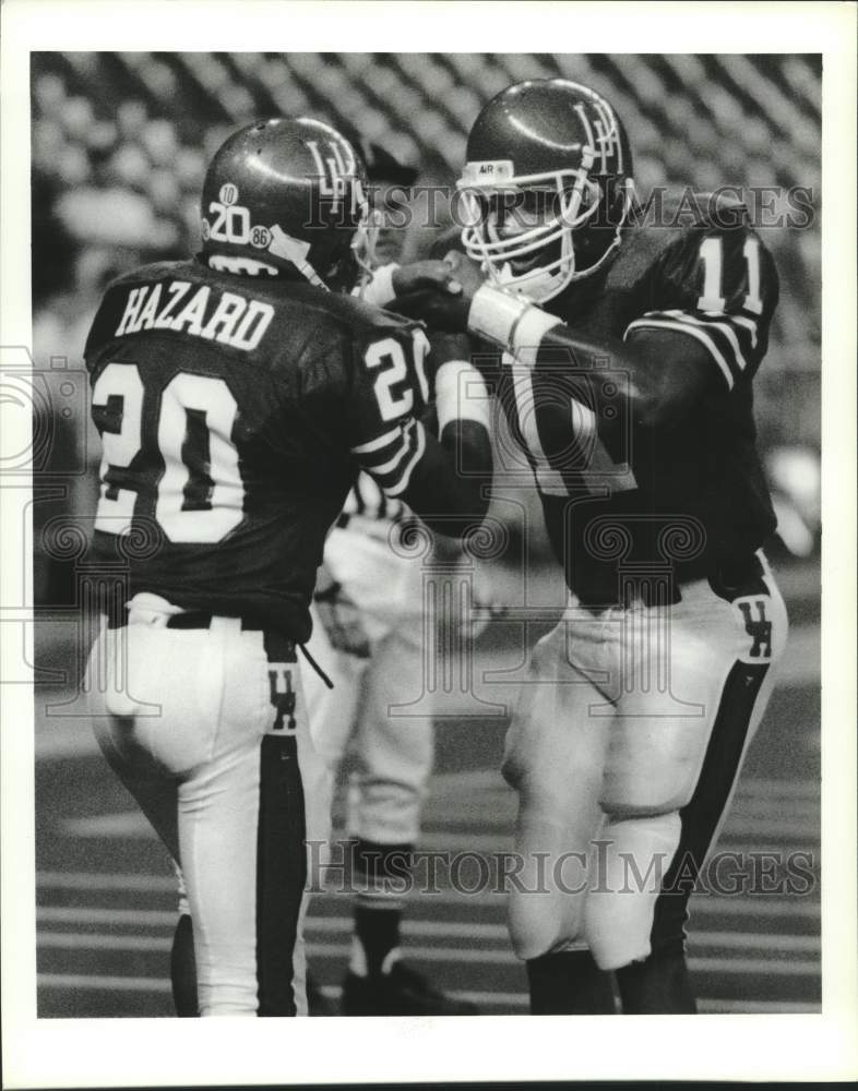 1989 Press Photo U of Houston football quarterback Andre Ware fist bumps #20- Historic Images