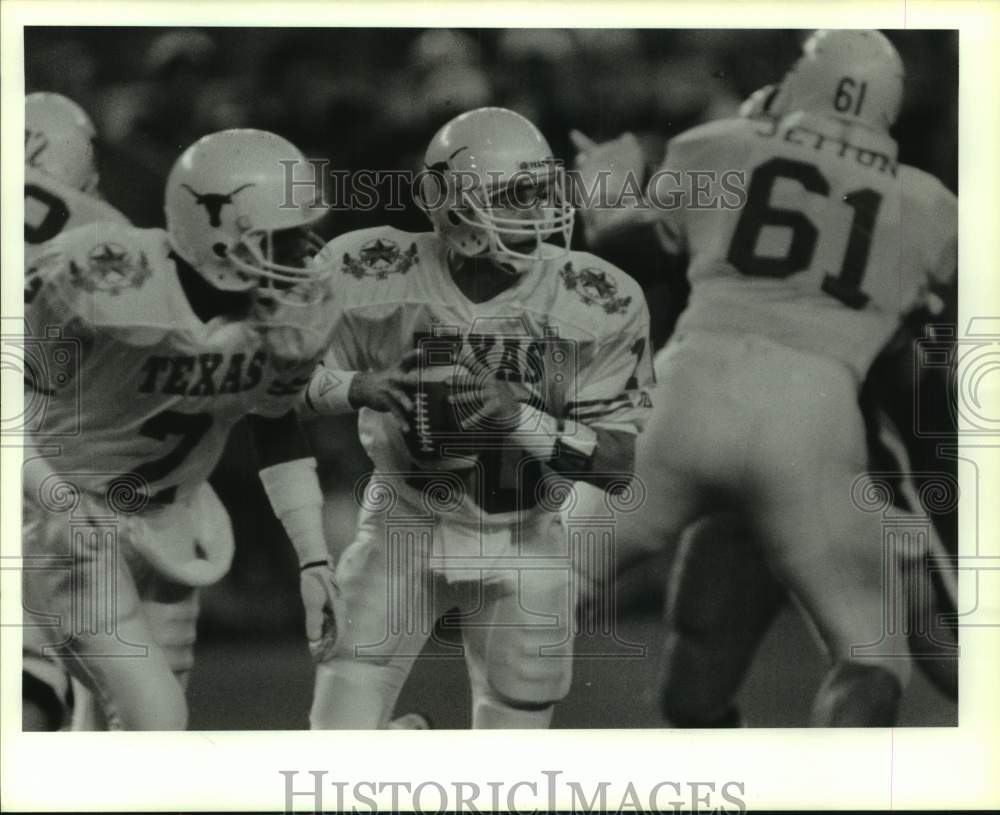 1987 Press Photo Texas college football players in action - hcs26110- Historic Images