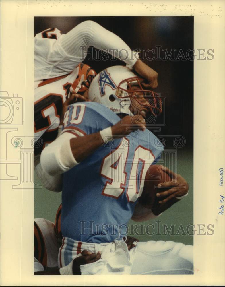 1985 Press Photo Houston Oilers' Butch Woolfolk hangs onto the ball - hcs26263- Historic Images