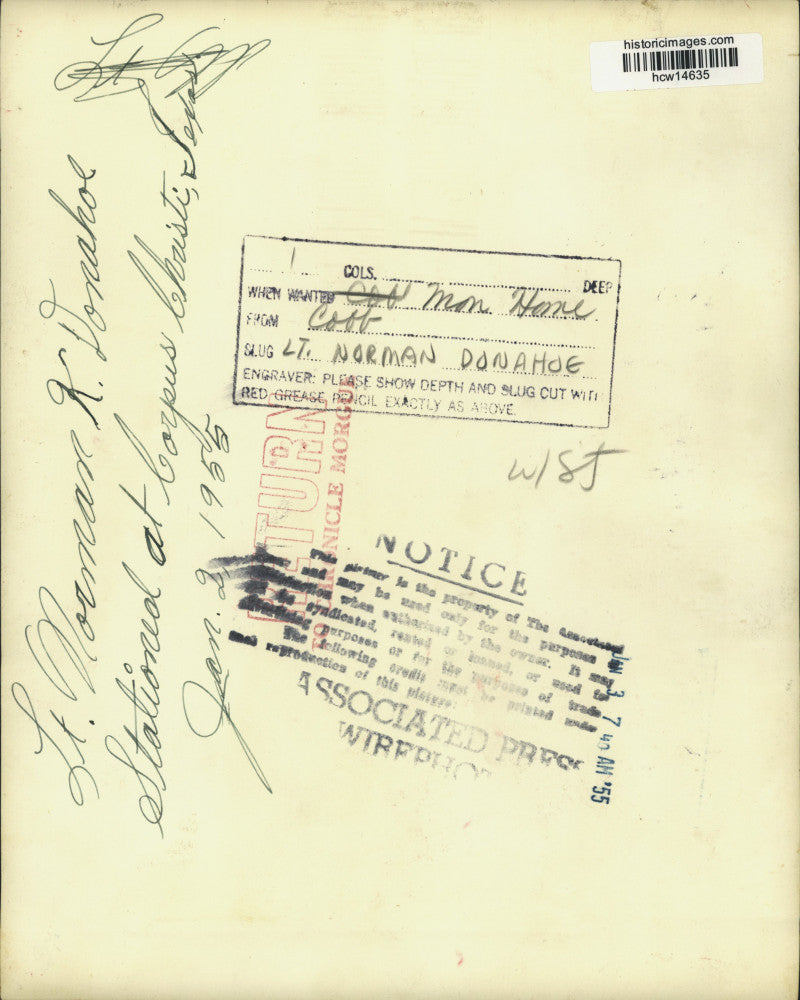 1955 Press Photo Lt. Norman Donahoe juggles foundling and diapers in Greece.